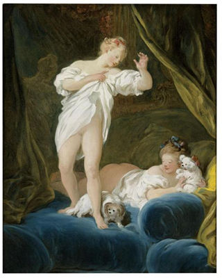 TWO GIRLS ON A BED PLAYING WITH THEIR DOGS