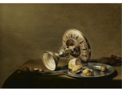 A STILL LIFE WITH AN OVERTURNED SILVER TAZZA, A SILVER PLATE WITH A PARTLY PEELED LEMON AND AN OLIVE, WITH WALNUTS AND HAZELNUTS ON A TABLE DRAPED WITH A GREEN CLOTH