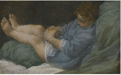 A SLEEPING BOY HOLDING AN APPLE