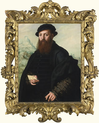 PORTRAIT OF A BEARDED GENTLEMAN, AGED 34, BEFORE AN EXTENSIVE LANDSCAPE