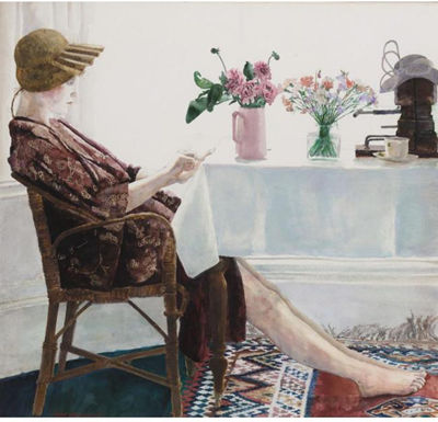 GIRL SITTING AT A TABLE