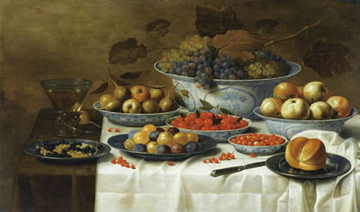 NATURE MORTE AUX FRUITS DANS DES PLATS DE DELFT SUR UN ENTABLEMENT
