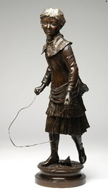 A bronze of a young girl with a skipping rope