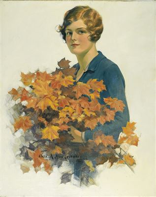Woman with autumn foliage bouquet