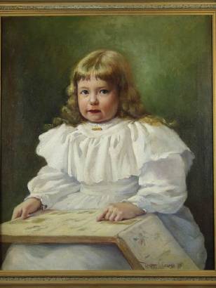 Portrait of a young girl in white dress