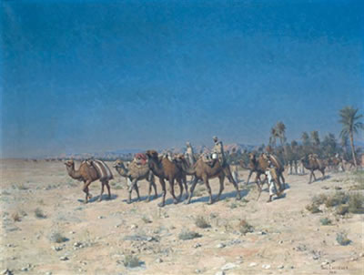CARAVANE TRAVERSANT UNE PALMERAIE