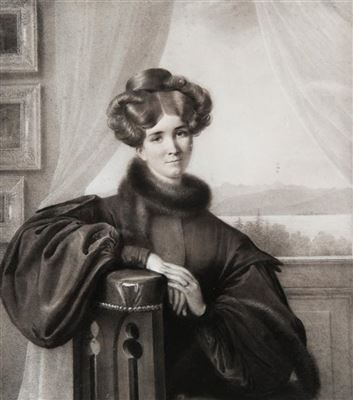 Portrait de femme devant un lac