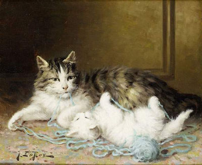 CHATS JOUANT AVEC LA PELOTE