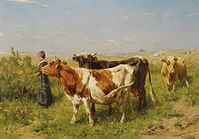 Shepherdess with cattle in pasture landscape
