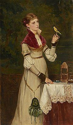 Jeune femme tenant un serin