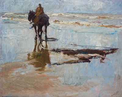 Pêcheur de crevettes à cheval sur la plage