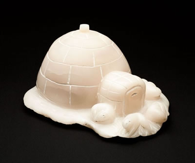 Scene with igloo and dogs