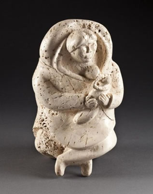 Mother breastfeeding her child