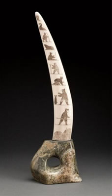 Engraved Walrus Tusk mounted on a stylized double-walrus stone base, 1999