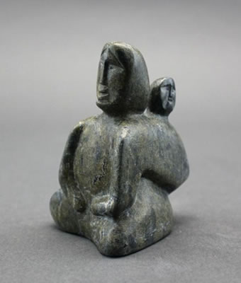 Kneeling mother and child