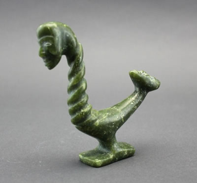 Two-headed spirit figure by Turataga Ragee - Auction record, sale price, and art valuation. Compare with similar artists and explore comparable artworks.