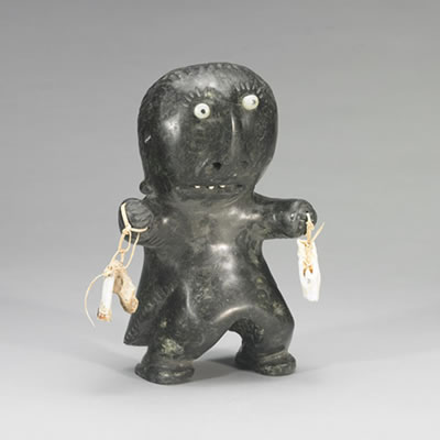 SHAMAN WITH BONES AND INSET EYES AND TEETH