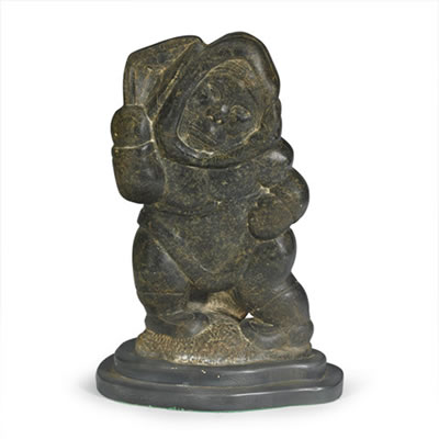 INUIT WOMAN WITH KUDLIK by Simeonie Weetaluktuk - Auction record, sale price, and art valuation. Compare with similar artists and explore comparable artworks.