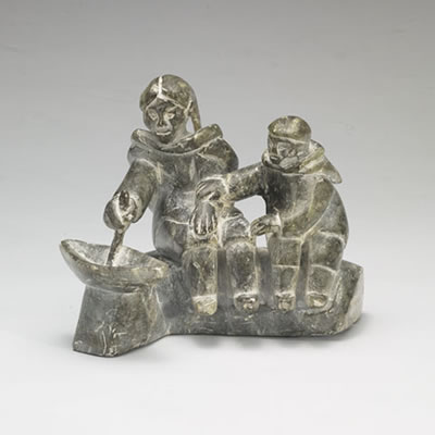 WOMAN AND CHILD WITH ULU
