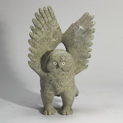 OWL WITH UPSWEPT WINGS