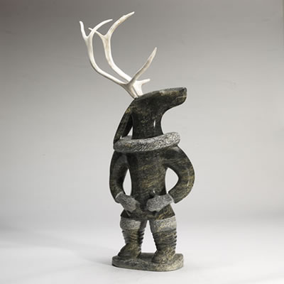 Sample artwork by Iyola Kingwatsiak (1933 - 2000), known for inuit themed stonecut sculpture, animal and figure - View similar artists and auction records