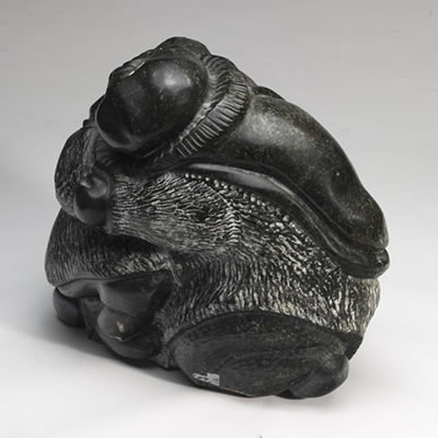 A FIGURE EMBRACING ANOTHER by Uriash Puqiqnak - Auction record, sale price, and art valuation. Compare with similar artists and explore comparable artworks.
