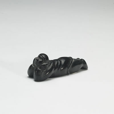 MAN LYING DOWN by Johnny Iquliq - Auction record, sale price, and art valuation. Compare with similar artists and explore comparable artworks.