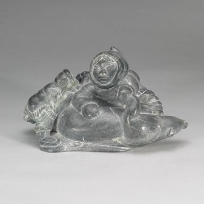 Hunter, child and bear