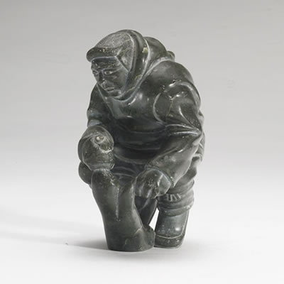 HUNTER HOLDING A FLIPPER by Peter Ussuqi Anauta - Auction record, sale price, and art valuation. Compare with similar artists and explore comparable artworks.