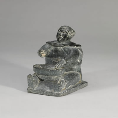 SEATED WOMAN WITH FISH