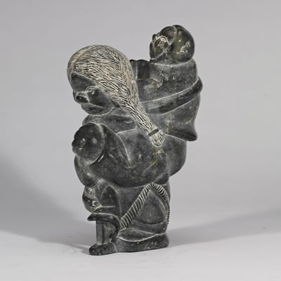 Sample artwork by Charlie Inukpuk (Born 1941), known for inuit sculpture, carving, figure, portrait, animals, shamans, doll heads, nomads - View similar artists and auction records