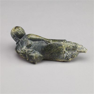 RECLINED MOTHER NURSING CHILD