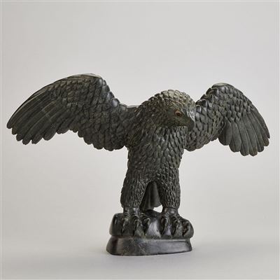 FALCON WITH OUTSTRETCHED WINGS