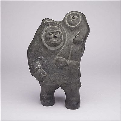 STANDING FIGURE HOLDING CHILD
