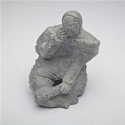 WOMAN FLENSING A SEAL by Eva Keatainaq - Auction record, sale price, and art valuation. Compare with similar artists and explore comparable artworks.