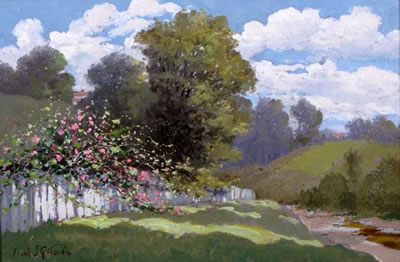 Roses along white fence