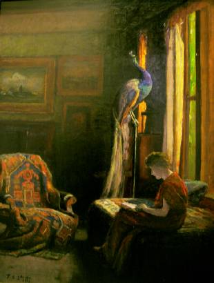 Interior scene of woman sitting in front of a window