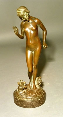 Female nude with frog