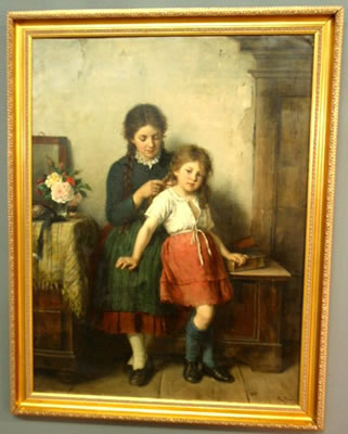 Interior scene with two girls braiding hair