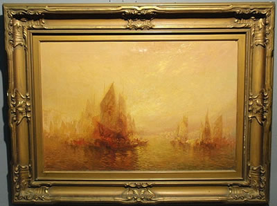 Sailing ships in harbor