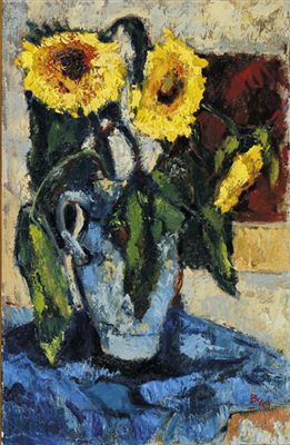 Sonnenblumen in blauem Krug.