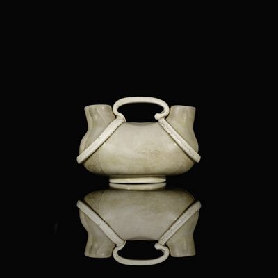 Rare Lattimo double-necked vase by Tomaso Buzzi - Auction record, sale price, and art valuation. Compare with similar artists and explore comparable artworks.
