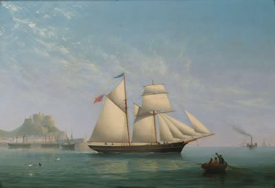 The Jersey trading schooner Sea Bird heading out from Gorey Harbour, Jersey, with Mont Orgueil Castle beyond