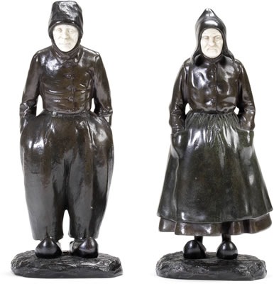 A pair of chryselephantine figures of Dutch peasants
