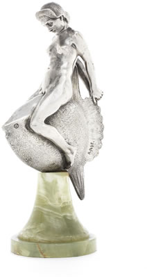 Modelled as a female nude seated upon a large stylised flat fish