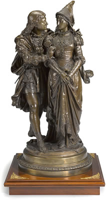 A French patinated and parcel gilt bronze group of Romeo and Juliet