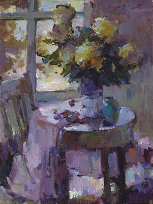 Still life with flowers and a blue vase on a table