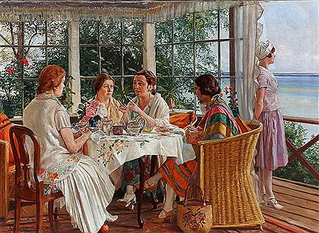 A group of ladies having tea on the patio.