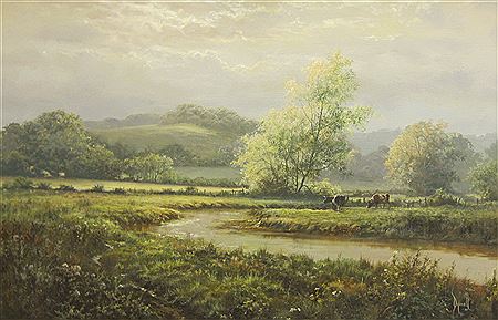 A river landscape with cattle grazing