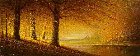 Fall landscape depicting a lakeshore with trees at sunset.
